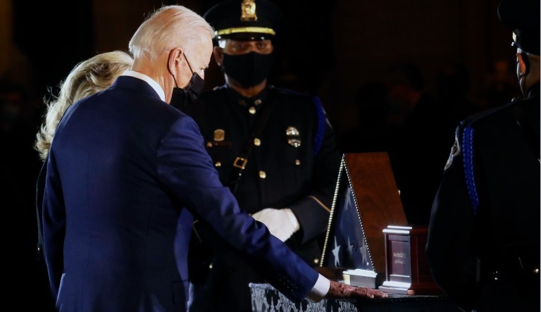 U.S. President Joe Biden and first lady Jill Biden pays his respect to U.S. Capitol Police officer Brian Sicknick, who died on January 7 from injuries he sustained while protecting the U.S. Capitol during the January 6 attack on the building, as he lies in honor at the U.S. Capitol in Washington, U.S., February 2, 2021.