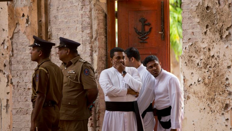 Clergymen visit the scene of a suicide bombing at St. Sebastian Church in Negombo, Sri Lanka, Monday, April 22, 2019. Easter Sunday bombings of churches, luxury hotels and other sites was Sri Lanka's deadliest violence since a devastating civil war in the South Asian island nation ended a decade ago. 