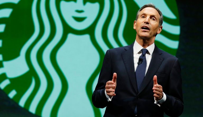 Howard Schultz, chairman and CEO of Starbucks Coffee Company, speaks Wednesday, March 19, 2014, at the company's annual shareholders meeting in Seattle.