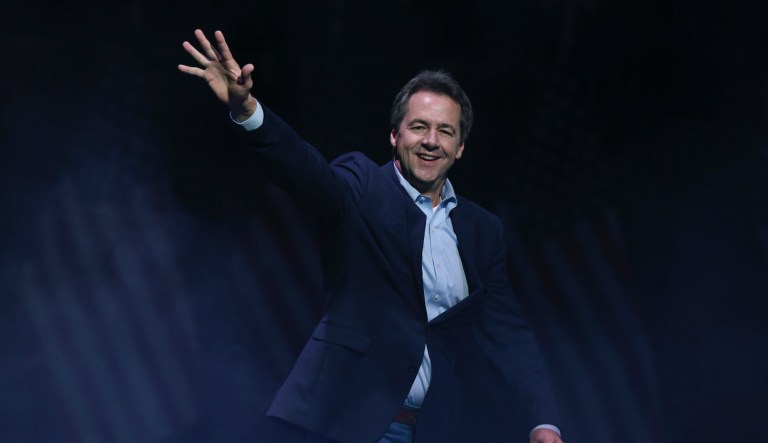 FILE -In this Feb. 23, 2019, file photo, Montana Gov. Steve Bullock walks to a meeting during the National Governors Association 2019 winter meeting in Washington.