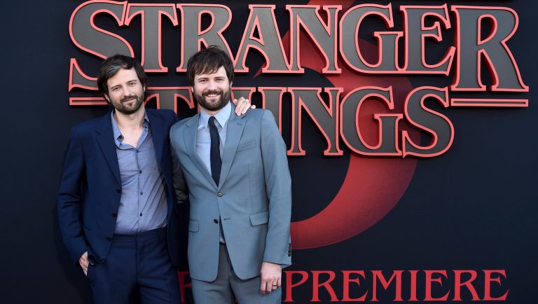 Directors Matt Duffer, left, and Ross Duffer arrives at the season three premiere of "Stranger Things" at Santa Monica High School on Friday, June 28, 2019, in Santa Monica, Calif. 