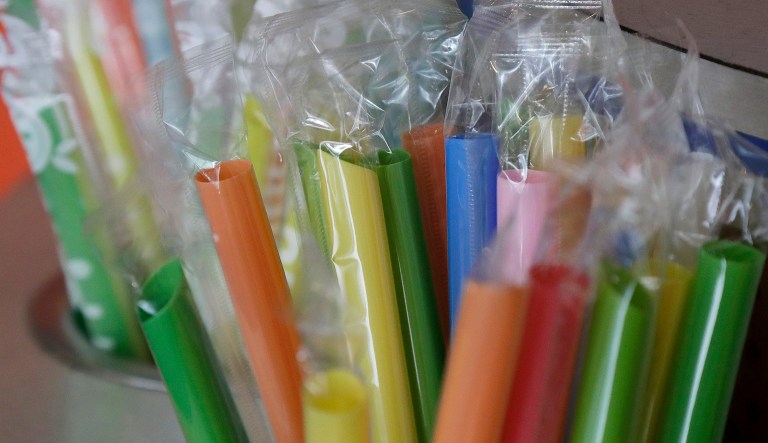 This July 17, 2018 photo shows wrapped plastic straws at a bubble tea cafe in San Francisco. Eco-conscious San Francisco joins the city of Seattle in banning plastic straws, along with tiny coffee stirrers and cup pluggers, as part of an effort to reduce plastic waste. It also makes single-use food and drink side items available upon request and phases out the use of fluorinated wrappers and to-go containers.