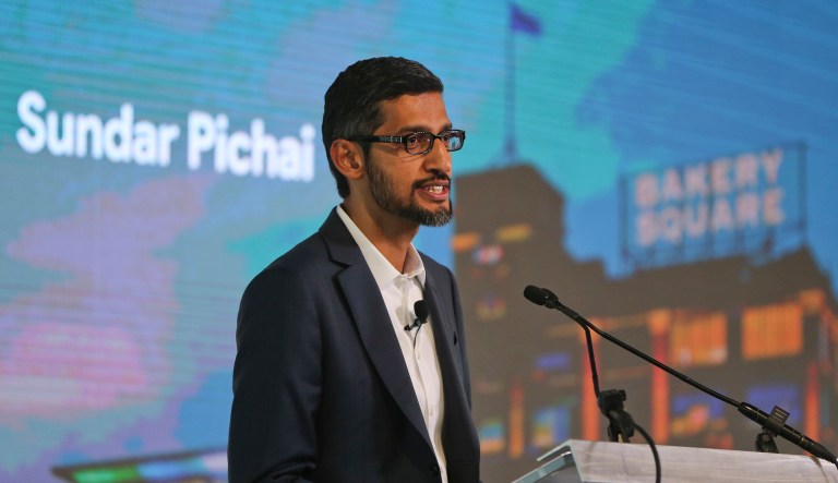 Google Chief Executive Officer, Sundar Pichai, stands in front of a projected image as he announces a new initiative called Grow with Google aimed at helping Americans get the skills they need to prepare for a job, find a job, or grow their business, during a news conference at the Google offices in Pittsburgh, Thursday, Oct. 12, 2017.