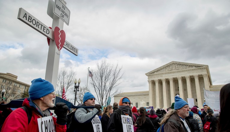 Pro-life activists converge in front of the Supreme Court in Washington, Friday, Jan. 27, 2017, during the annual March for Life. Thousands of anti-abortion demonstrators gathered in Washington for an annual march to protest the Supreme Court's landmark 1973 decision that declared a constitutional right to abortion.