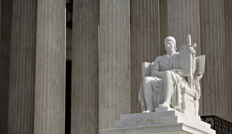 The "Authority of Law" statue sits at the U.S. Supreme Court in Washington, D.C., U.S.