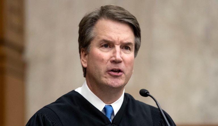 President Trump's Supreme Court nominee, Judge Brett Kavanaugh, officiates at the swearing-in of Judge Britt Grant on Aug. 7, 2018, at the U.S. District Courthouse in Washington.
