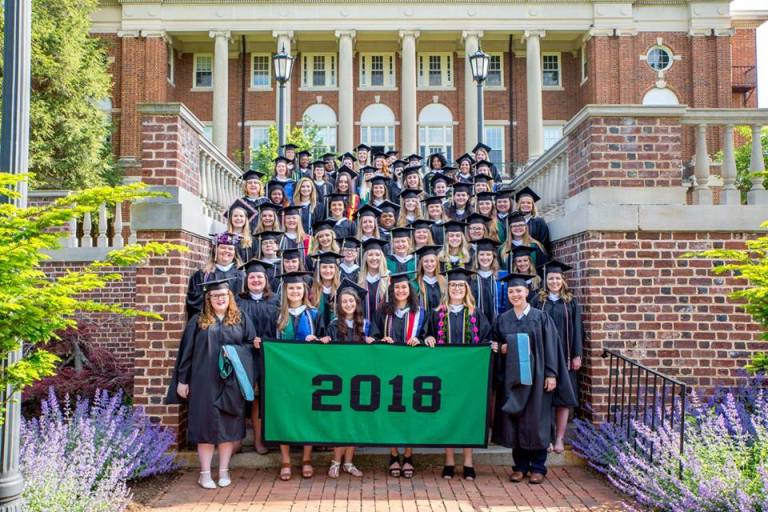 Graduates of the class of 2018 pose for a photo.