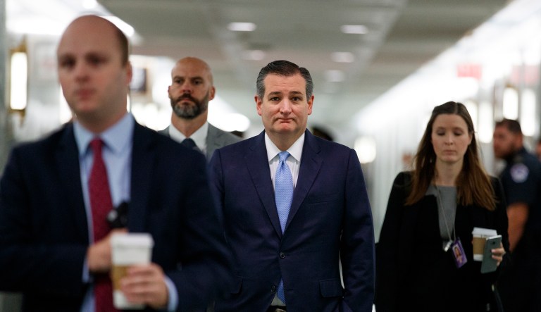 Sen. Ted Cruz, R-Texas, arrives for the Senate Judiciary Committee hearing on Capitol Hill in Washington, Thursday, Sept. 27, 2018, with Christine Blasey Ford and Supreme Court nominee Brett Kavanaugh.