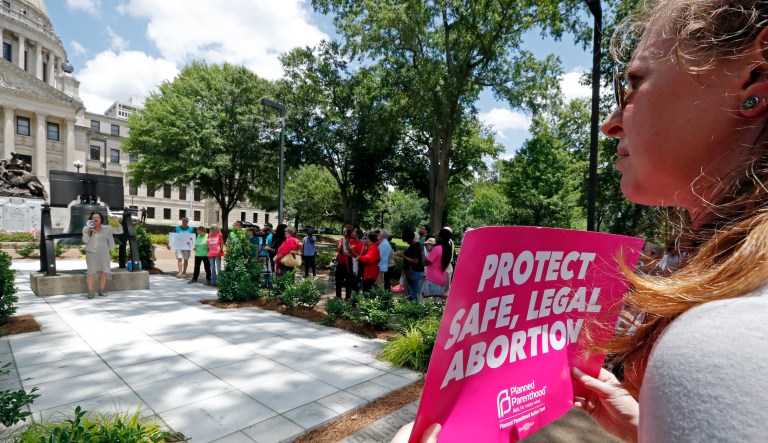 DOJ takes aim at Texas abortion law