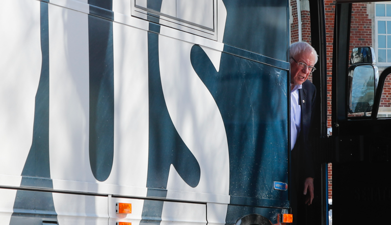 Democratic presidential candidate Sen. Bernie Sanders, I-Vt. , stepping off his bus as he arrives for a campaign event at The Black Box Theater, Saturday, Feb. 1, 2020, in Indianola, Iowa. (AP Photo/Pablo Martinez Monsivais)