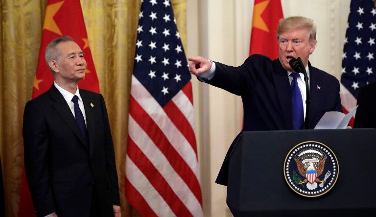 President Donald Trump speaks before signing a trade agreement with Chinese Vice Premier Liu He, left, in the East Room of the White House, Wednesday, Jan. 15, 2020, in Washington. 