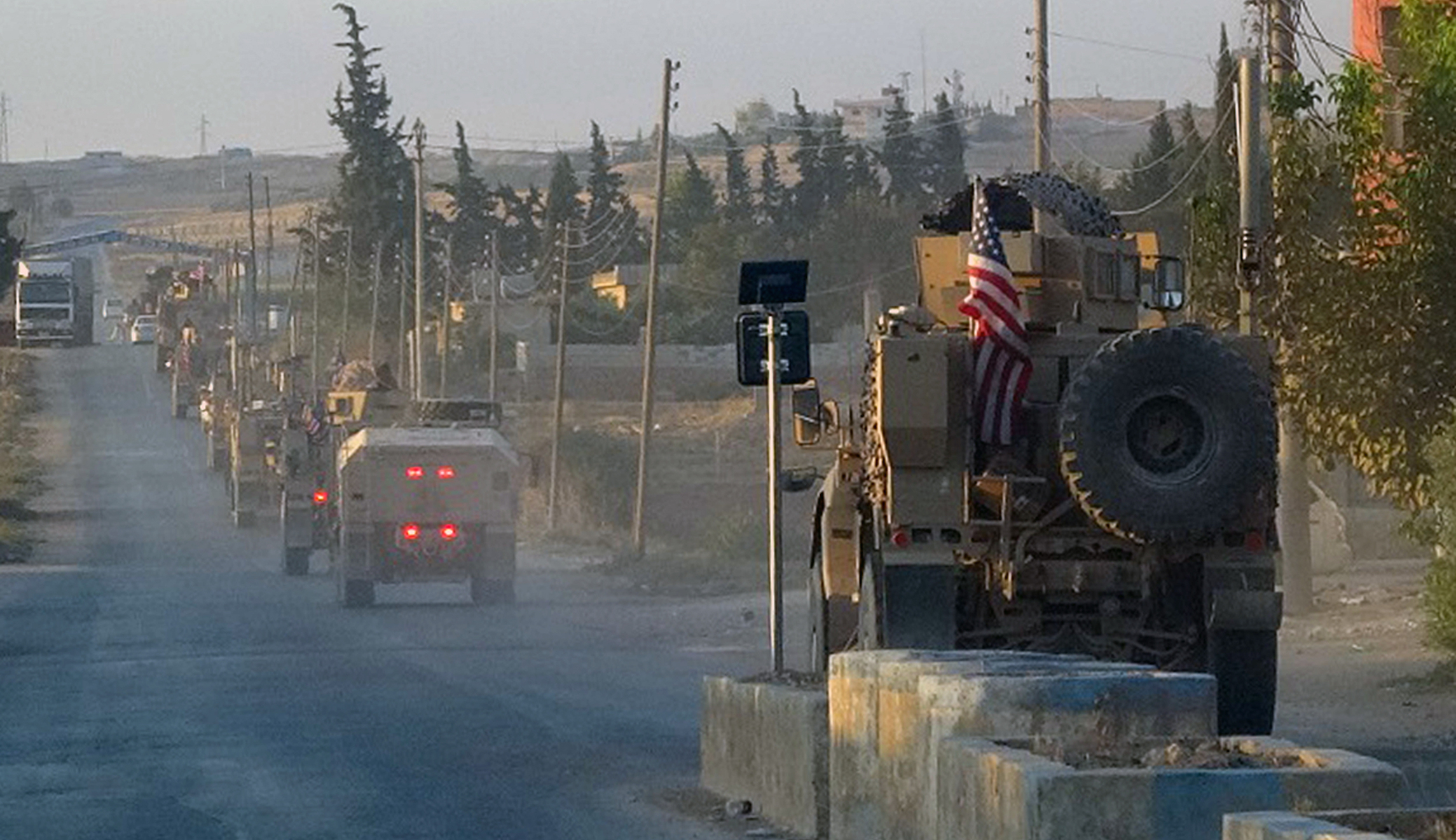 WATCH: Rotten fruit, rocks thrown at US troops as they pull out of Syria