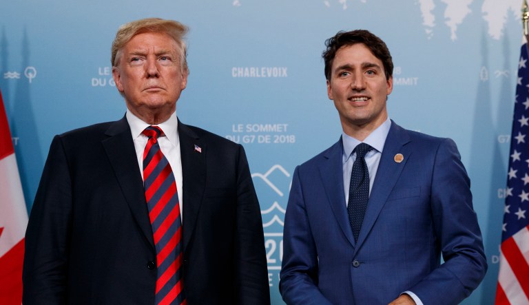 U.S. President Donald Trump meets with Canadian Prime Minister Justin Trudeau at the G-7 summit, Friday, June 8, 2018, in Charlevoix, Canada.