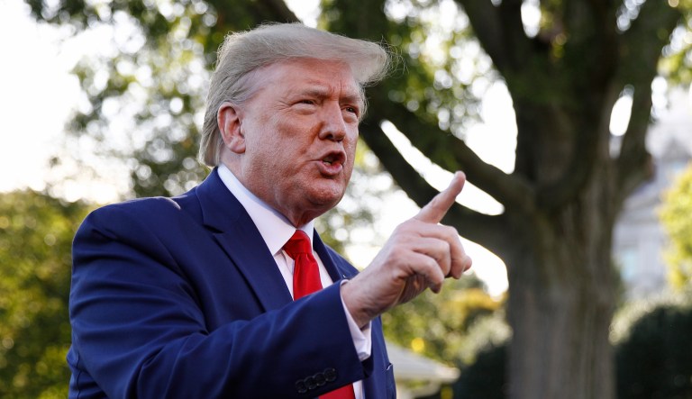 President Donald Trump speaks to members of the media on the South Lawn of the White House in Washington, Thursday, Oct. 10, 2019, before boarding Marine One for a short trip to Andrews Air Force Base, Md., and then on to Minneapolis, for a campaign rally.