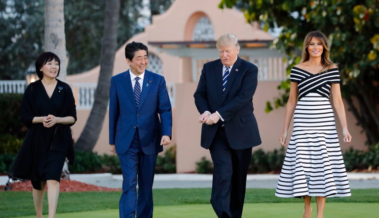 FILE - In this April 17, 2018, file photo, Then-Japanese Prime Minister Shinzo Abe, center left, and his wife Akie Abe, left, then-President Donald Trump, center right, and then-first lady Melania Trump, right, walk to dinner at Trump's private Mar-a-Lago club, in Palm Beach, Florida. 