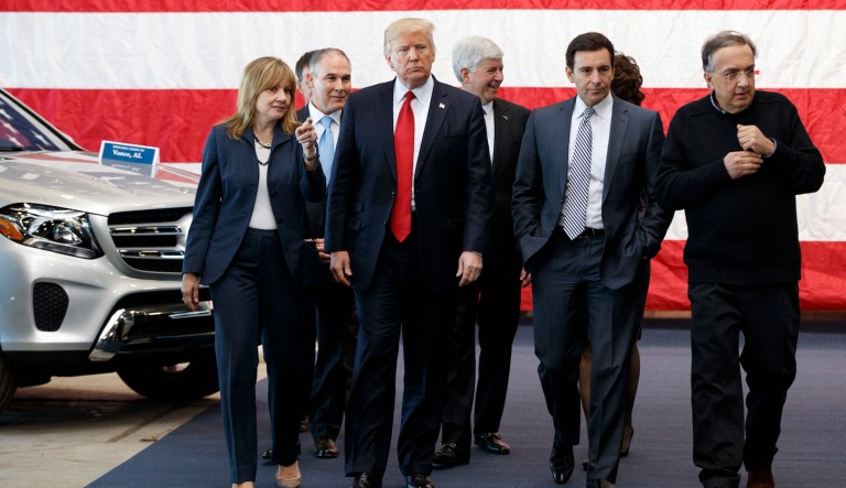 President Donald Trump tours the American Center of Mobility, Wednesday, March 15, 2017, in Ypsilanti Township, Mich. From left are, GM CEO Mary Barra, EPA administrator Scott Pruitt, Trump, Michigan Gov. Rick Snyder, Ford CEO Mark Fields, and Fiat Chrysler Sergio Marchionne.