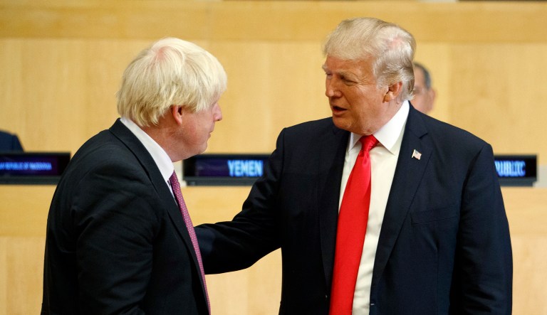 President Donald Trump talks with British Minister of Foreign Affairs Boris Johnson during the "Reforming the United Nations: Management, Security, and Development" meeting during the United Nations General Assembly, Monday, Sept. 18, 2017, in New York.