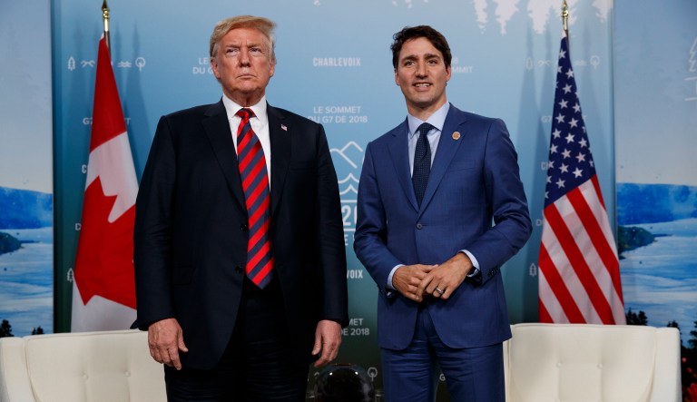 U.S. President Donald Trump meets with Canadian Prime Minister Justin Trudeau at the G-7 summit, Friday, June 8, 2018, in Charlevoix, Canada.