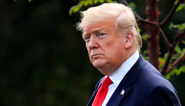 President Donald Trump walks on the South Lawn of the White House in Washington, Wednesday, Oct. 10, 2018,  to Marine One for the short trip to Andrews Air Force Base, Md.,  en route to speak at a rally, in Erie, Pa.