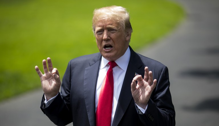 U.S. President Donald Trump speaks to members of the media before departing for New York on the South Lawn of the White House in Washington, D.C., on Wednesday, May 23, 2018. Secretary of StateÂ Mike PompeoÂ acknowledged -- after prodding by lawmakers -- that he backs the finding by U.S. intelligence agencies that Russia meddled in the U.S. presidential campaign to hurtÂ Hillary ClintonÂ and ultimately help Trump.