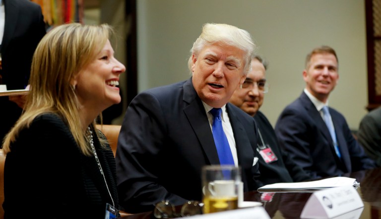 President Donald Trump, center, speaks at the start of a meeting with automobile leaders in the Roosevelt Room of the White House in Washington, Tuesday, Jan. 24, 2017. From left are, General Motors CEO Mary Barra, the president, Fiat Chrysler Automobiles CEO Sergio Marchionne, and Shane Karr, head of External Affairs, Fiat Chrysler Automobiles North America.