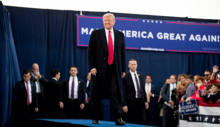 President Donald Trump arrives for a rally at Southern Illinois Airport in Murphysboro, Ill., Saturday, Oct. 27, 2018.