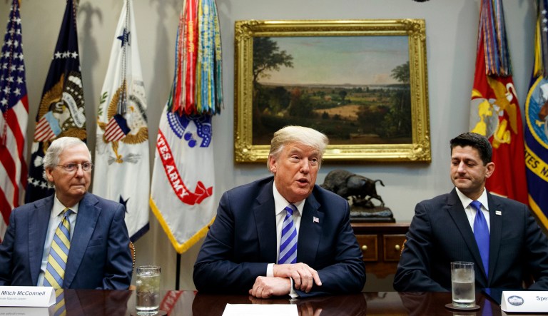 Senate Majority Leader Mitch McConnell, R-Ky., left, and Speaker of the House Rep. Paul Ryan, R-Wis., right, listen as President Donald Trump speaks during a meeting with Republican lawmakers in the Roosevelt Room of the White House, Wednesday, Sept. 5, 2018, in Washington.