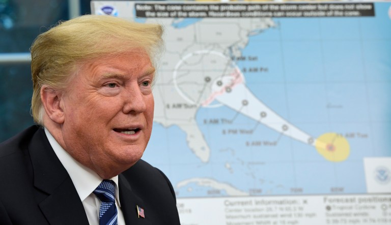 President Donald Trump talks about Hurricane Florence following a briefing in the Oval Office of the White House in Washington, Tuesday, Sept. 11, 2018.