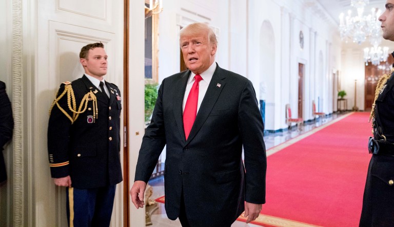 President Donald Trump arrives for an event to salute U.S. Immigration and Customs Enforcement (ICE) officers and U.S. Customs and Border Protection (CBP) agents in the East Room of the White House in Washington, Monday, Aug. 20, 2018.