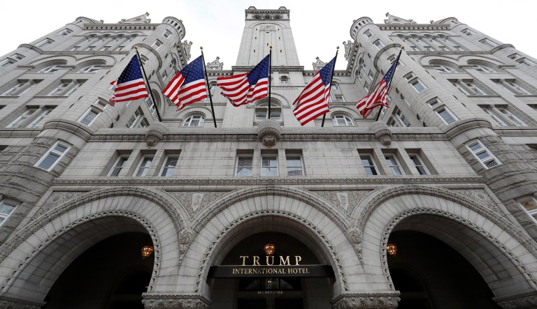 FILE - In this Dec. 21, 2016, file photo The Trump International Hotel at 1100 Pennsylvania Avenue NW, is seen in Washington. Celebrity chef Jose Andres has settled his dispute with The Trump Organization after backing out of a plan to open a restaurant in Washingtonâs Trump hotel. Andresâ ThinkFoodGroup and The Trump Organization issued a statement Friday, April, 7, 2017, saying the lawsuit has been settled. The dealâs terms are confidential.