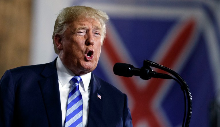 President Donald Trump speaks at Fort Drum, N.Y., Monday, Aug. 13, 2018, before a signing ceremony for a $716 billion defense policy bill named for Sen. John McCain.