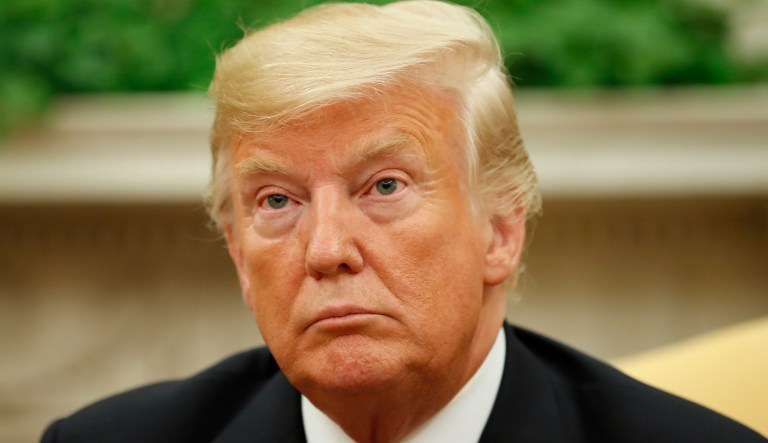 President Donald Trump listens with Kenyan President Uhuru Kenyatta in the Oval Office of the White House, Monday, Aug. 27, 2018, in Washington.