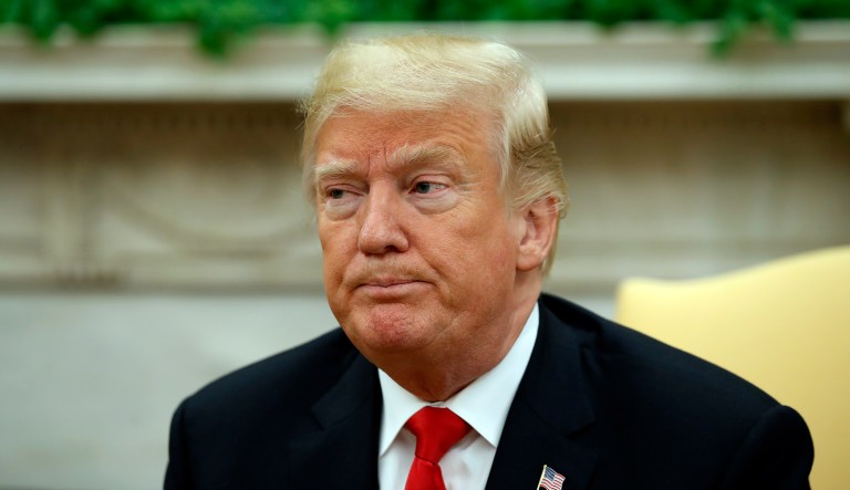 President Donald Trump pauses while speaking during a meeting with Chilean president Sebastian Pinera, in the Oval Office of the White House, Friday, Sept. 28, 2018, in Washington.