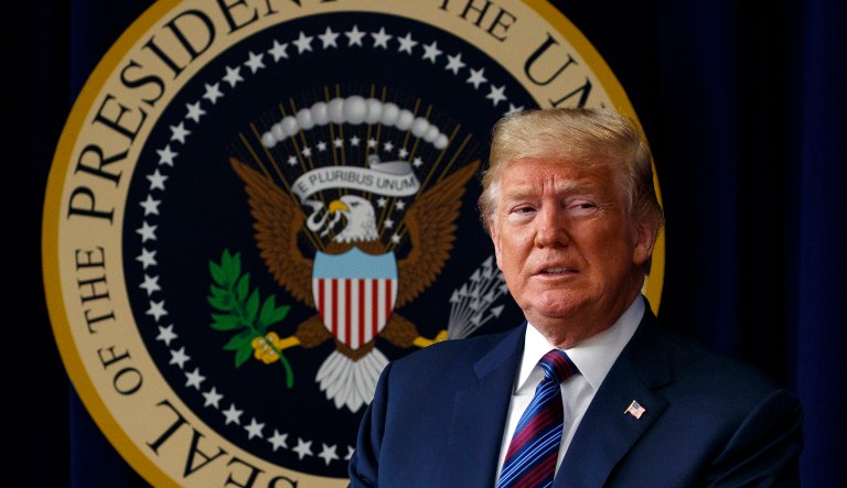 In this May 30, 2018 photo, President Donald Trump arrives for a bill signing ceremony in the South Court Auditorium on the White House campus, Wednesday, May 30, 2018, in Washington.  President Donald Trump says he has "absolute right to PARDON myself" but says has "done nothing wrong" in the Russia probe.