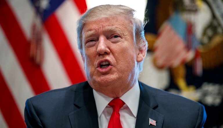 President Donald Trump speaks during an event on human trafficking in the Cabinet Room of the White House, Friday, Feb. 1, 2019, in Washington.