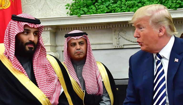 President Trump speaks to Mohammed bin Salman, Saudi Arabia's crown prince, in the Oval Office of the White House on Tuesday, March 20, 2018.