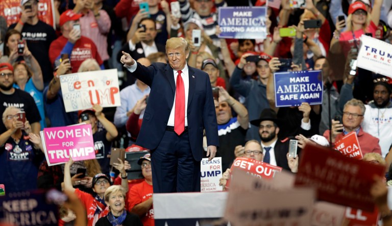 President Donald Trump greets supporters before speaking at a campaign rally, Monday, Nov. 5, 2018, in Cleveland.