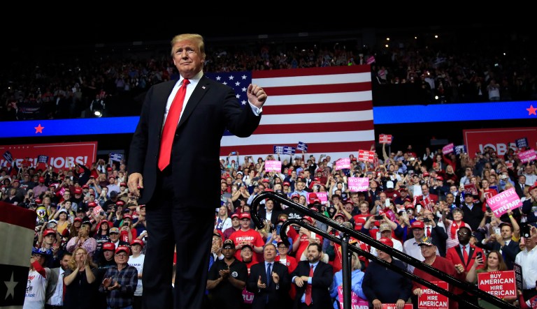 President Donald Trump arrives to speak at a rally in Grand Rapids, Mich., Thursday, March 28, 2019.