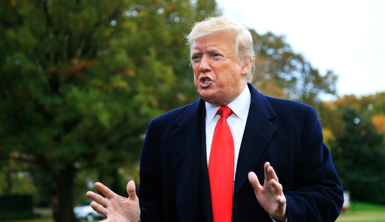 President Donald Trump speaks to the members of the media on the South Lawn before leaving the White House in Washington, Friday, Nov. 2, 2018.