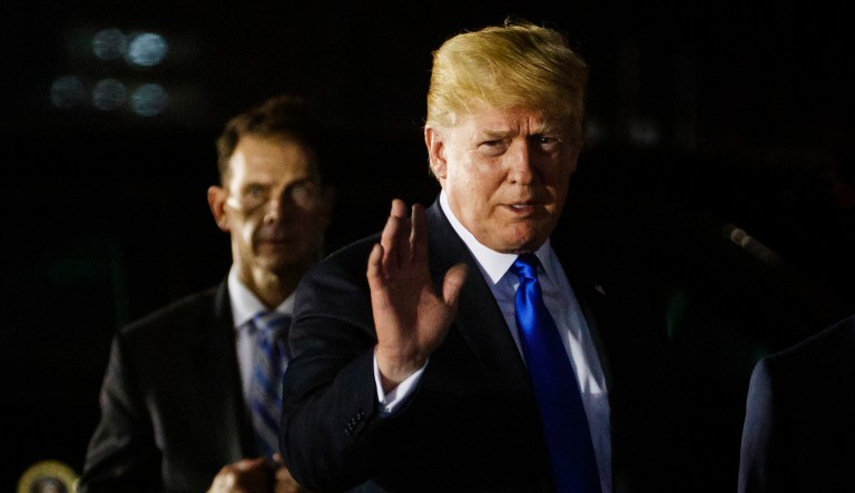 FILE - In this Sunday, June 10, 2018, file photo, U.S. President Donald Trump arrives at Paya Lebar Air Base for a summit with North Korean leader Kim Jong Un.