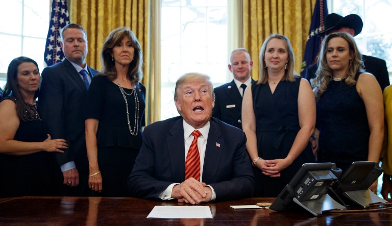 President Donald Trump meets with crew and passengers of Southwest Airlines Flight 1380, including pilot Tammie Jo Shults, third from left, in the Oval Office of the White House in Washington, Tuesday, May 1, 2018.