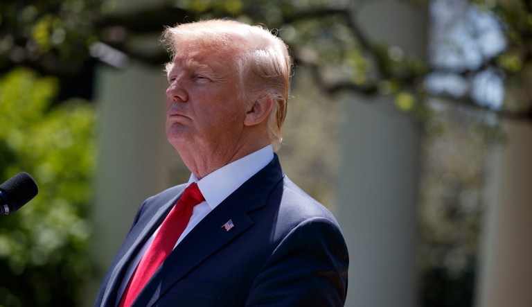 President Donald Trump listens during a news conference with President Muhammadu Buhari in the Rose Garden of the White House, Monday, April 30, 2018, in Washington.
