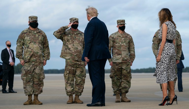 President Donald Trump and first lady Melania Trump arrive at Pope Army Field for an event with troops at Fort Bragg, Thursday, Oct. 29, 2020, in Pope Field, N.C. 