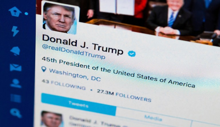FILE - This April 3, 2017, file photo shows U.S. President Donald Trump's Twitter feed on a computer screen in Washington.  President Donald Trump violates the U.S. Constitution's First Amendment when he blocks critics on Twitter for political speech, a judge ruled Wednesday, May 23, 2018. 