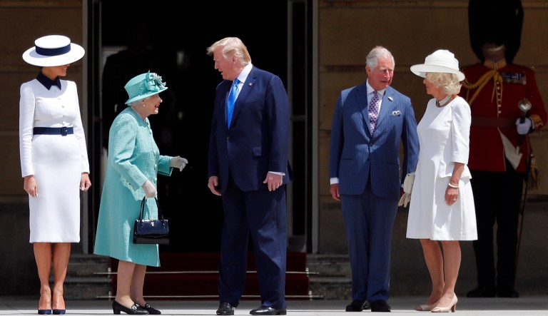 Britain's Queen Elizabeth II greets President Donald Trump, center, and first lady Melania Trump, left, with Britain's Prince Charles and Camilla, Duchess of Cornwall during a ceremonial welcome in the garden of Buckingham Palace in London, Monday, June 3, 2019 on the opening day of a three day state visit to Britain.