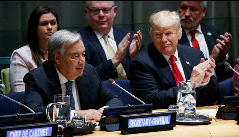 President Donald Trump listens as United Nations Secretary General Antonio Guterres speaks at the United Nations General Assembly, Monday, Sept. 24, 2018, in New York.