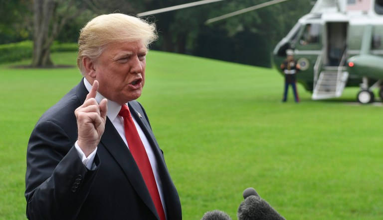 President Donald Trump speaks to reporters on the South Lawn of the White House in Washington, Monday, Oct. 8, 2018, as he heads to Marine One for the short trip to Andrews Air Force Base. Trump is traveling to Florida for the day.