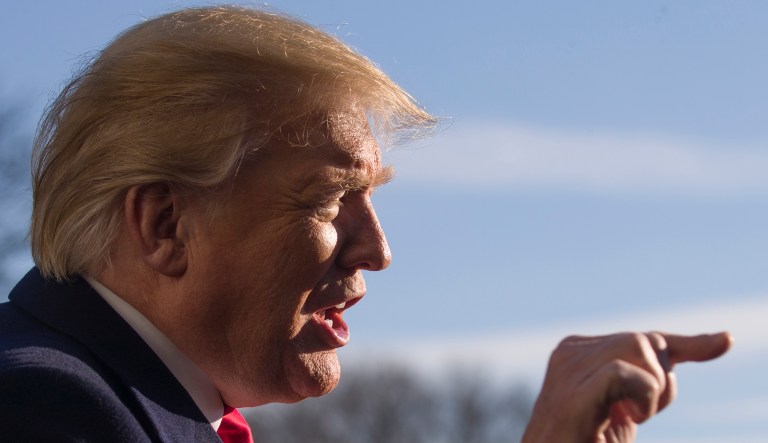 President Donald Trump speaks on the South Lawn of the White House as he walks from Marine One, Sunday, Jan. 6, 2019, in Washington. Trump is returning from a trip to Camp David.