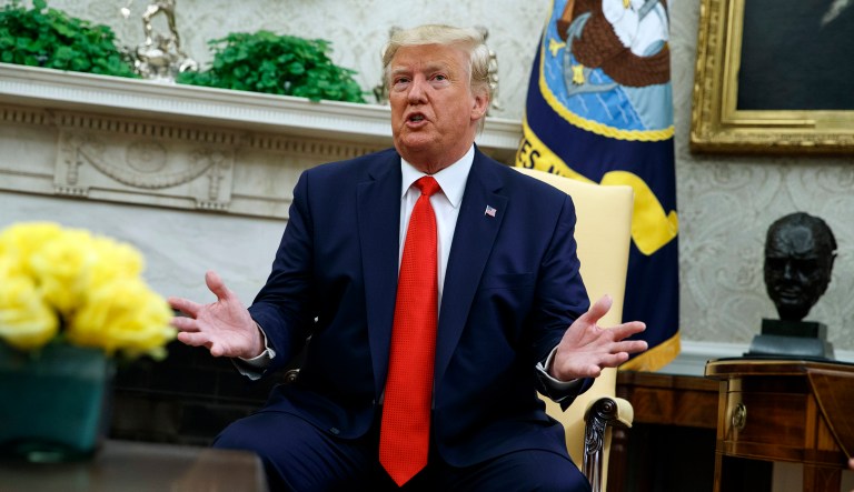 President Donald Trump talks about a plan to ban most flavored e-cigarettes, in the Oval Office of the White House, Wednesday, Sept. 11, 2019, in Washington.