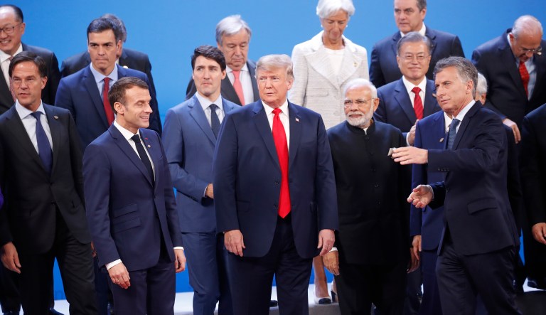 World leaders get ready for a family photo at the G20 summit, Friday, Nov. 30, 2018 in Buenos Aires, Argentina.
